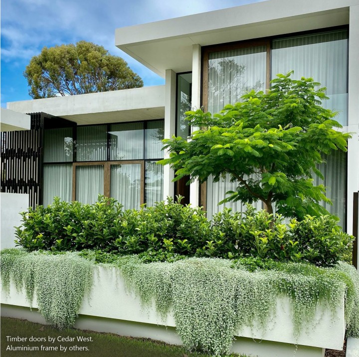 Timber sliding doors front elevation contemporary home