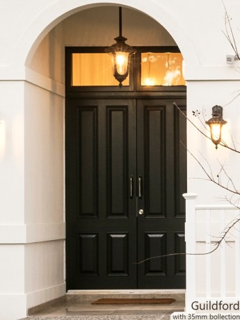 Guildford four panel timber door painted black Cedar West