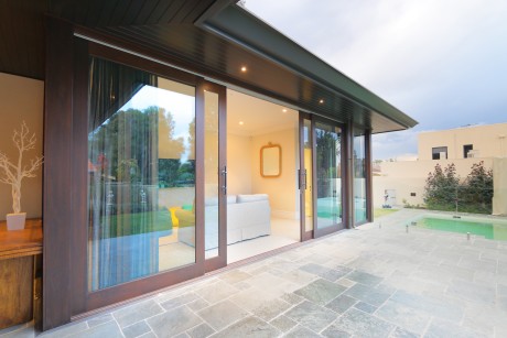 Sliding door dark timber large format glass solid Cedar West