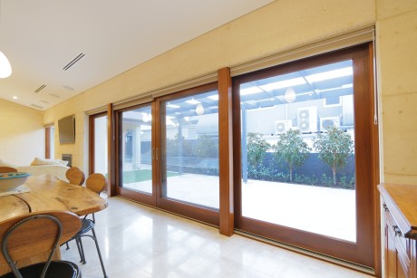 Sliding door living area large solid timber flyscreens Cedar West