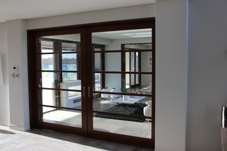 Glass timber cavity sliding door Cedar West