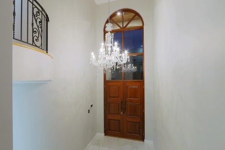 O'Connor timber door lites above three panel wood Cedar West